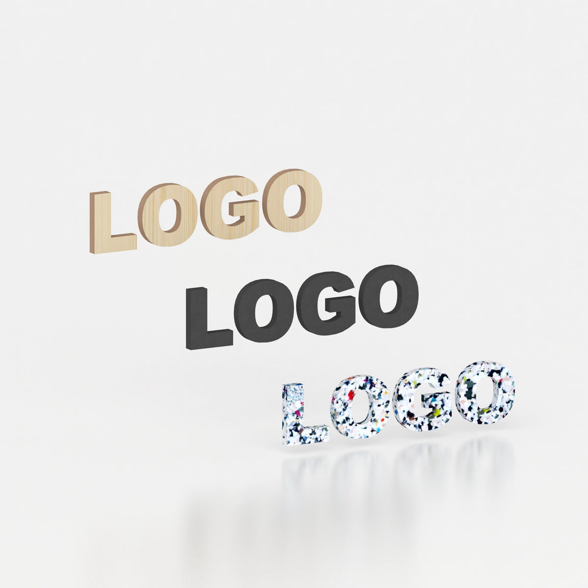 Lettrage et logo en relief obtenus par découpe numérique pour la signalétique de marque.